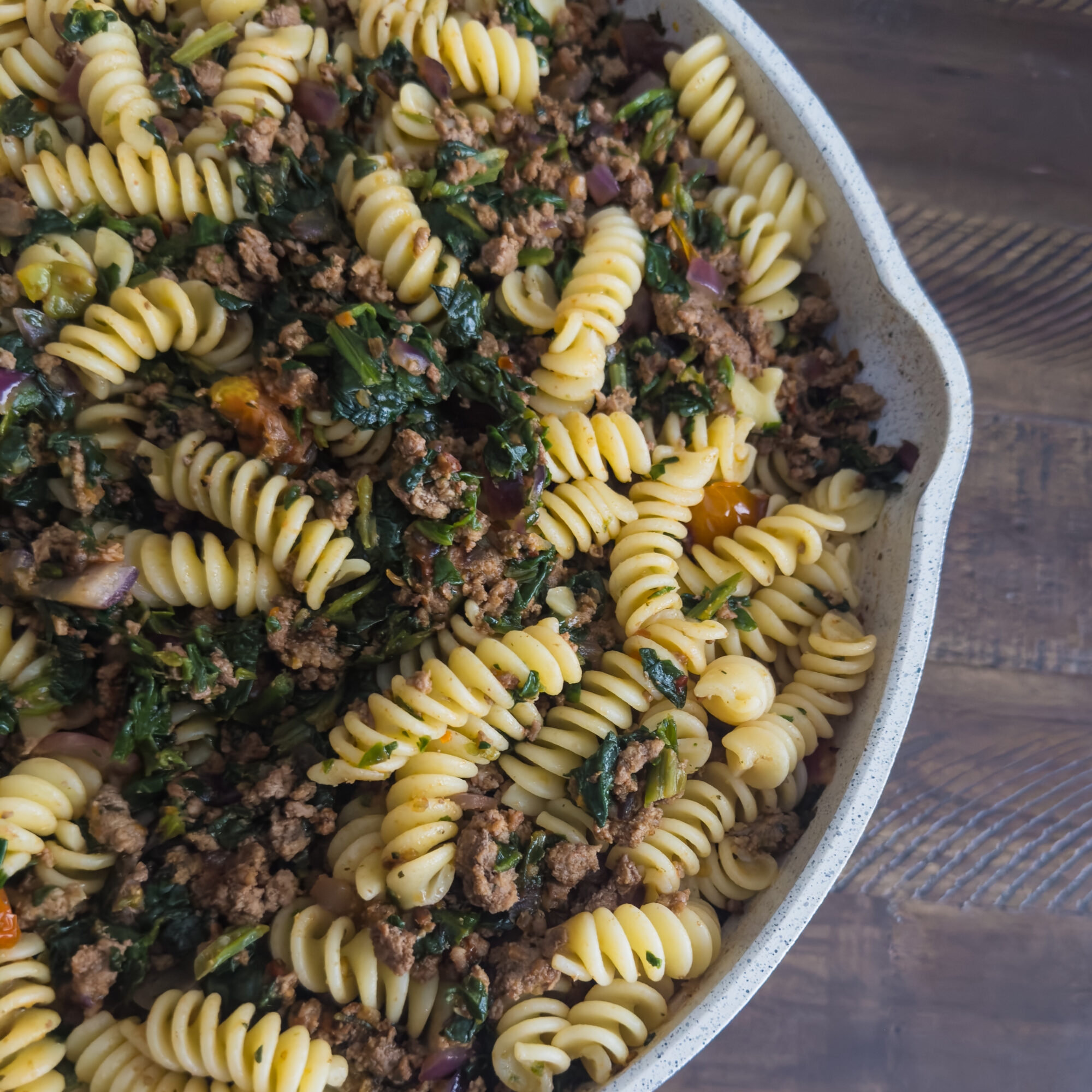 Fusilli pasta with ground lamb and spinach